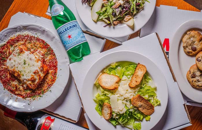 Lasagna, two salads, cookies, and sparkling water from San Diego’s Best Pizza.